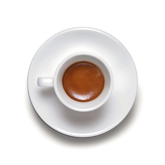 A cup of coffe espresso on white